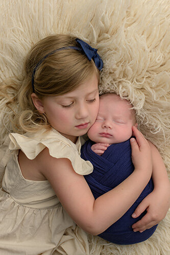 sleeping newborn with floral headband