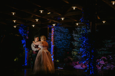 “Couple’s romantic first dance in a rustic barn wedding venue near Amarillo