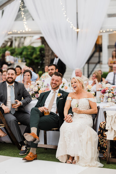 Bride and groom during toasts at Woodbine Mansion reception planned by Bianca Nichole and Co
