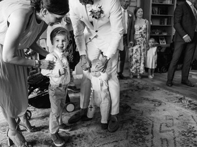 Black and white photo of little kids on wedding day