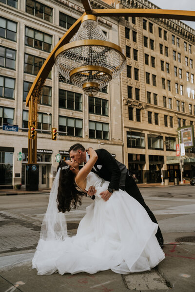 Groom dips bride at Public Square