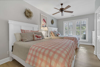 Bedroom three - features two queen beds with coral decor