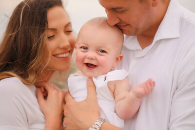 Little boy embraces his mother during Family Photoshoot on Kiawah Island.