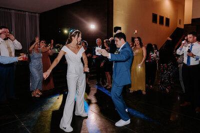 bride and groom dancing at their wedding