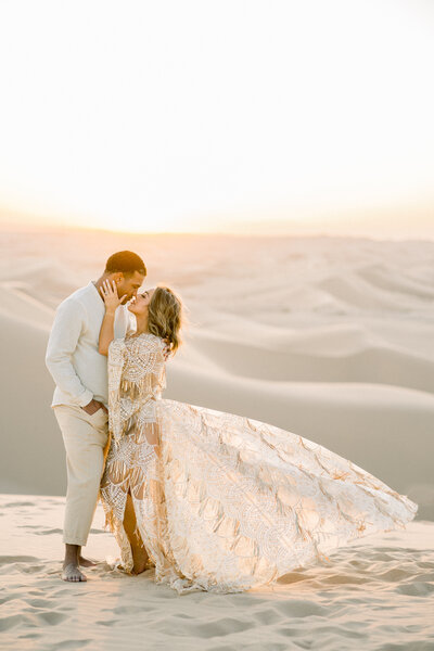 engagement session at sand dunes in california by destination engagement photographer.