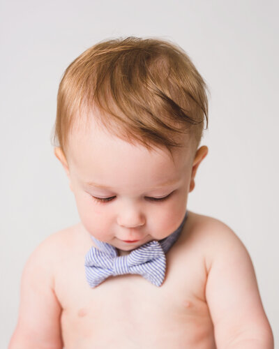 Fine art milestone detail — 1-year-old with birthday cake, Sausalito photographer
