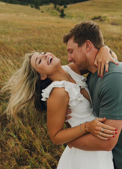 woman kissing mans beard