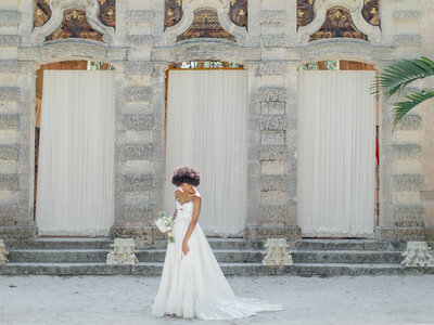 Bride and groom walk up memorial steps at their DC wedding