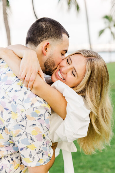 couple kissing at SOUTH POINTE PARK in Miami Florida