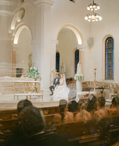 bride and groom during their catholic ceremony in Miami