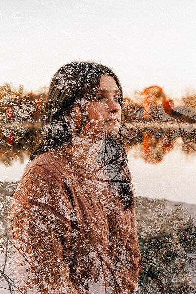 A high school senior captured in Krop Kreative's signature multiple exposure style during a fall lake life session—Lake Geneva lifestyle photography.