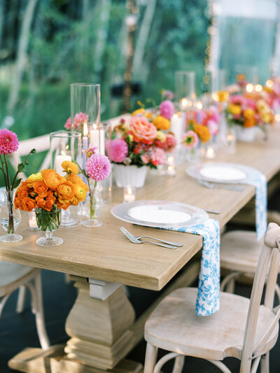 bride and groom walking down stairs in between aspen trees in Grand Lake CO by Colorado Wedding Photographer JKG Photography