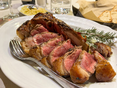 A bistecca fiorentina cooked to perfection from Osteria Dell'Enoteca in Florence, Italy