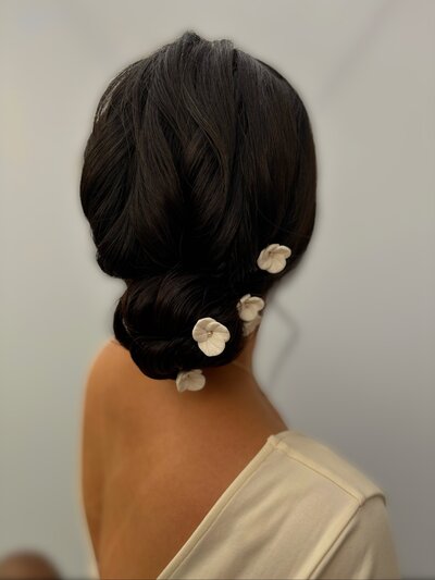 Modern, clean textured low bun with Claire Austin England Floral pins, Sommerley House Wedding