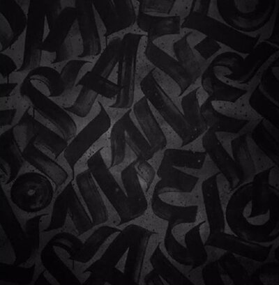Black and concrete pattern with text overlay