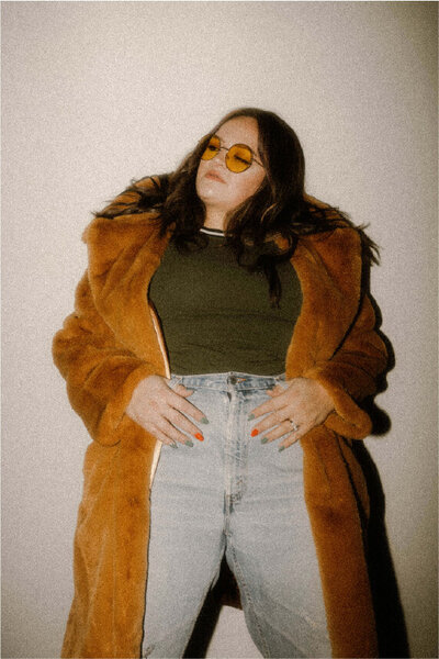 Amanda in a brown vintage coat