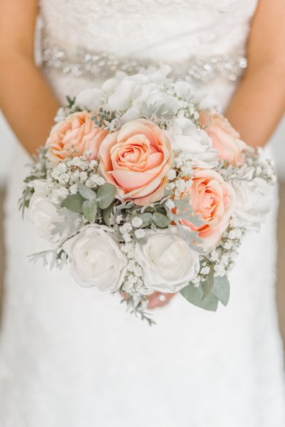 Investment - Bride Holding Flowers