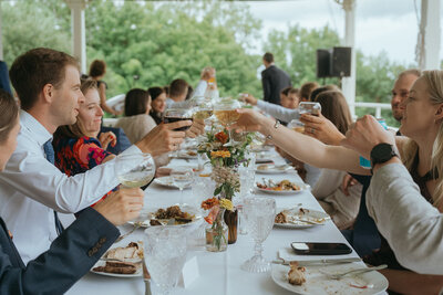 reception cheers captured by vermont wedding photographer elsie goodman