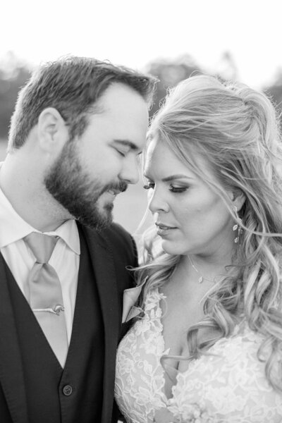 bride and groom embracing