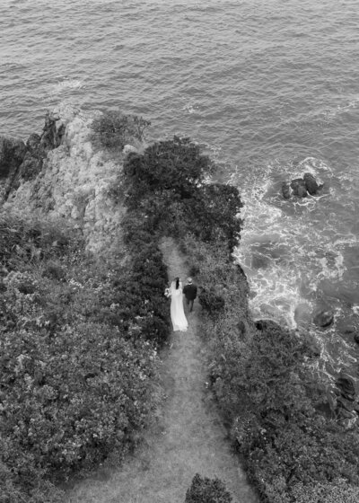 drone photo of bride and groom walking newport wedding