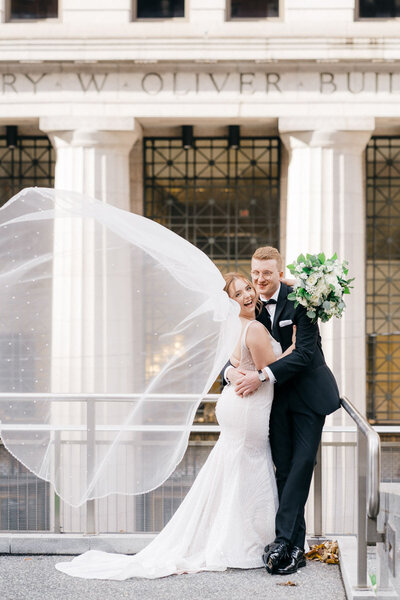Downtown Pittsburgh  wedding couple portrait joyful