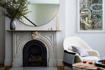 Brownstone design in Boston blending quiet luxury and historic home design, featured in Rue Magazine. A New England renovation that honors original detail with modern living.