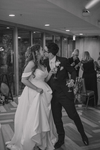 bride and groom kissing during st louis wedding photos