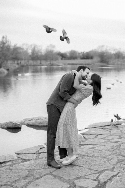 Photo of couple surrounded by greenery after their proposal by Austin Engagement Photographer Lois M Photography