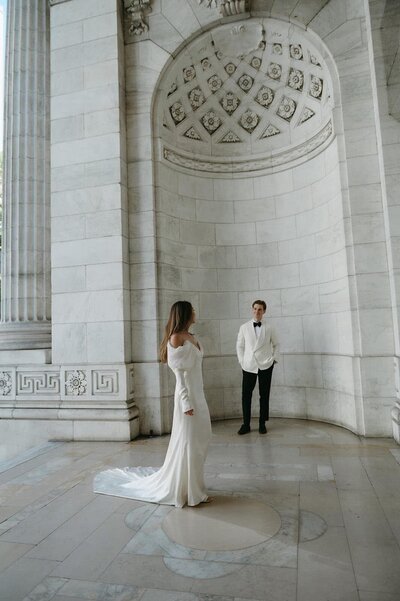 Sophisticated couples session by Staci Brucks Photography featuring couple in luxurious museum setting