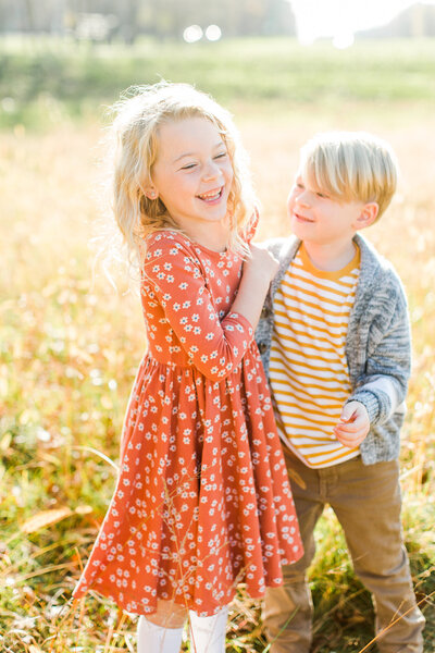 brother and sister playing