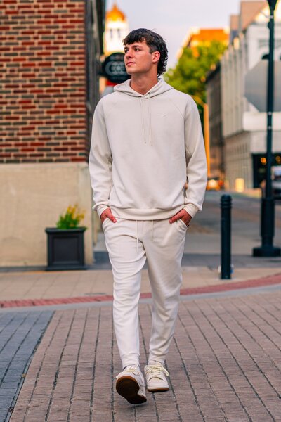 Senior Boy Crossing Street
