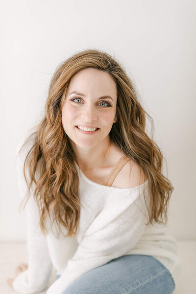 self portrait of Virginia Schultz owner of newborn photography studio