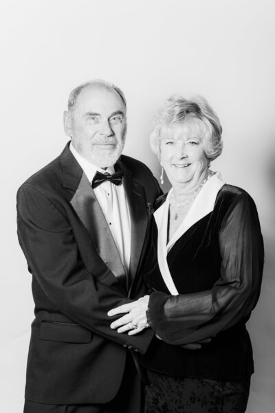 Elegant black and white portrait of a formally dressed couple captured at a Vogue Portrait photo booth in Richmond, VA.