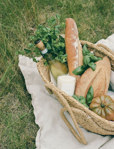straw market tote with baguette, batard, bread, herbs, wine, Detroit Rose Smoked Tomato Candle branding photography on film