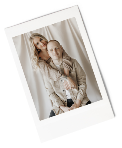 Polaroid of woman hugging man from behind while they look forward