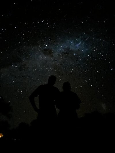 Stars at Simanya Lodge in Nkurenkuru, with people observing