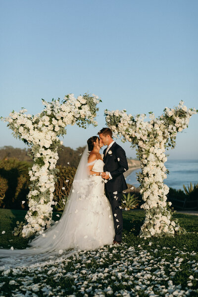 Bride and groom walk up memorial steps at their DC wedding