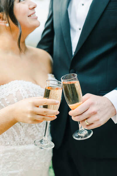 Elegant wedding celebration on a picturesque golf course in El Dorado Hills, CA, with the bride and groom surrounded by rolling hills and golden sunset light.