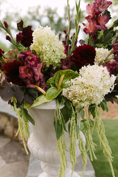 Close-up of colorful wedding floral arrangement at a Colorado garden wedding venue, captured by Colorado wedding photographer Mrs. Ferree Photography
