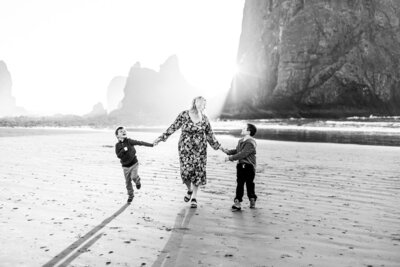 family photograph by Haystack Rock in Cannon Beach, Oregon.