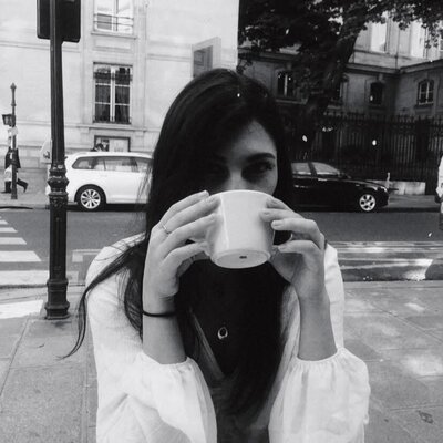 Ashlyn web designer drinking coffee