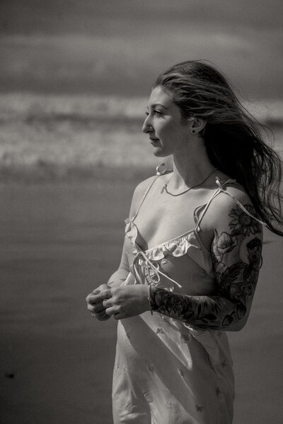Couples portraits of alternative, tattooed couple on railroad tracks in Tennessee.