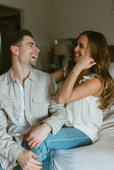 man & woman laughing