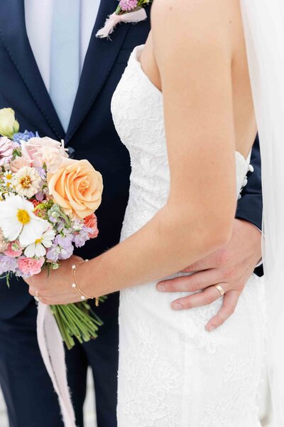 A bride and groom hold each other at their Tampa wedding