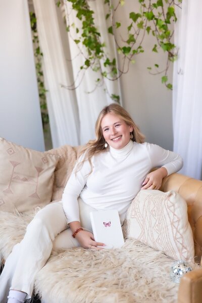 Picture of Rachel sitting on couch