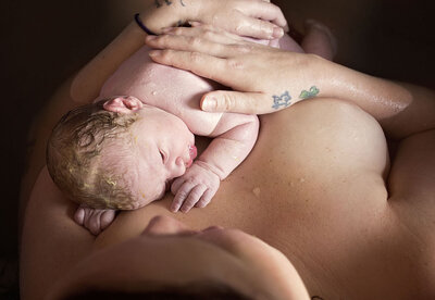 Love and laughter from this happy couple excited to meet their first baby.