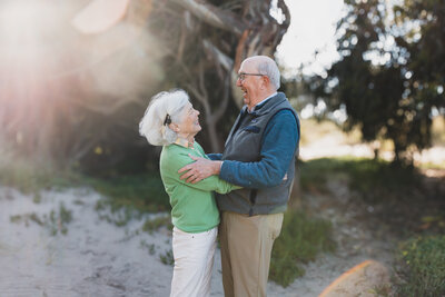 Grandparents embracing Santa Cruz Ody Mac Photo