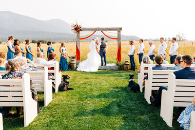 Outdoor wedding ceremony at Cattle Springs venue in Arlee, Montana