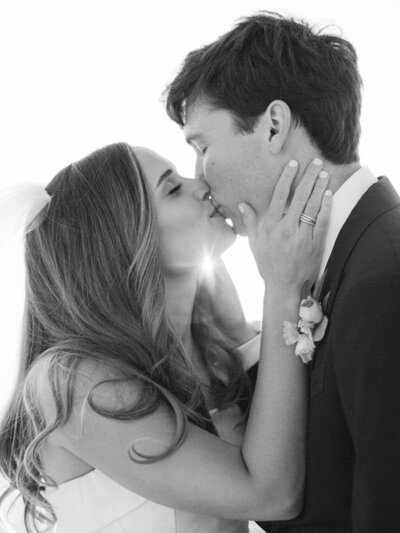 Bride and groom kissing at Alys Beach wedding