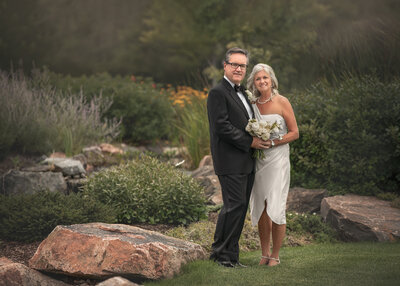 "Wedding photo – bride and groom sharing tender embrace, capturing love and connection"